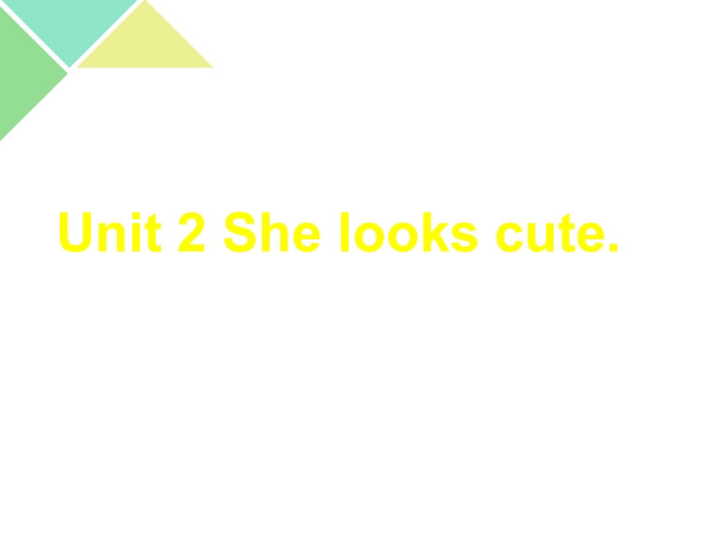 五年级上册英语课件-unit 2 she looks cute 人教（精通）.ppt_第1页